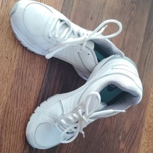 White gel soled tennis shoes